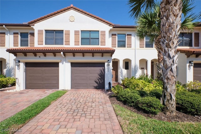 view of front of property with a garage