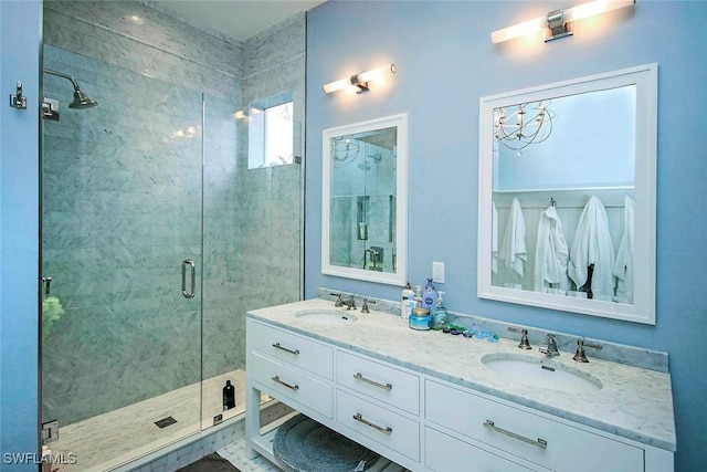 bathroom featuring vanity and walk in shower