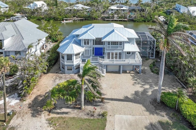 birds eye view of property featuring a water view