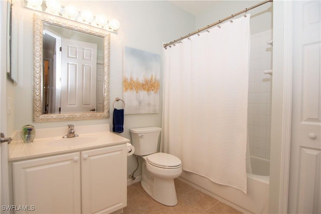 full bathroom with shower / bath combo with shower curtain, tile patterned floors, toilet, and vanity