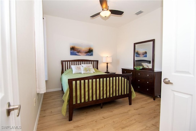 bedroom with ceiling fan and light wood-type flooring