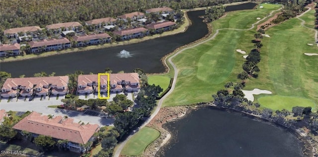 birds eye view of property featuring a residential view, view of golf course, and a water view