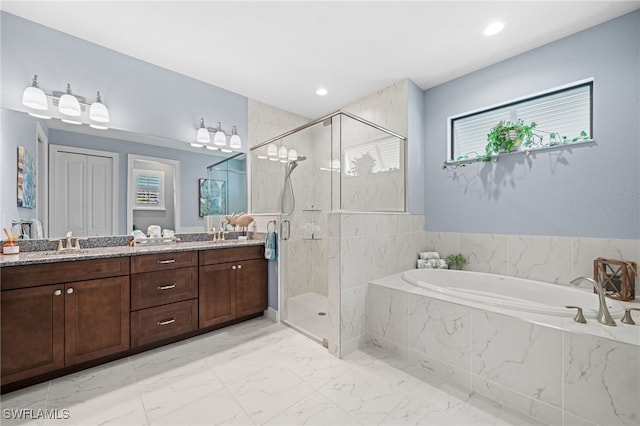 142 SW 35th Ave, Cape Coral, FL 33991 - bathroom featuring vanity and independent shower and bath