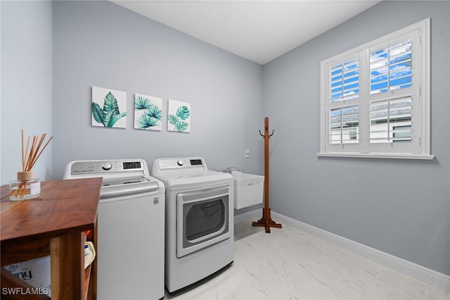 142 SW 35th Ave, Cape Coral, FL 33991 - washroom with sink and washing machine and clothes dryer