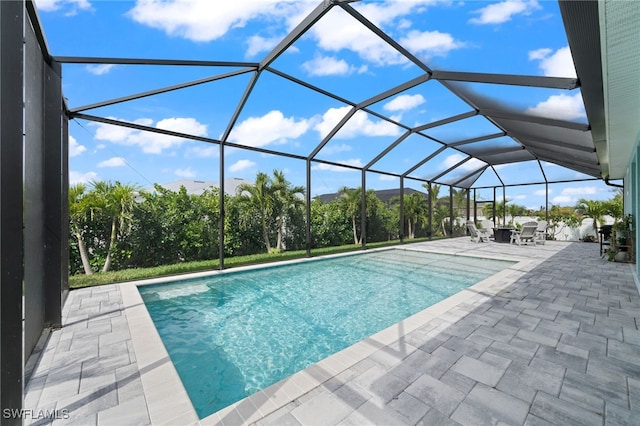 142 SW 35th Ave, Cape Coral, FL 33991 - view of swimming pool with a patio and glass enclosure