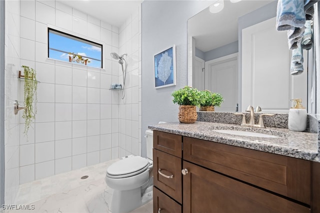 142 SW 35th Ave, Cape Coral, FL 33991 - bathroom with vanity, toilet, and a tile shower