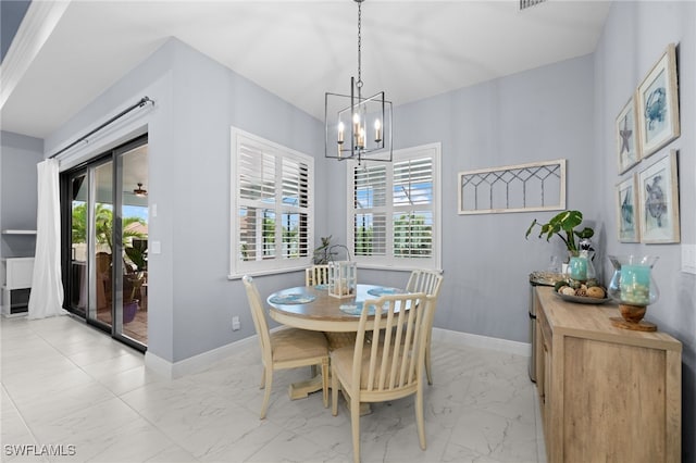 142 SW 35th Ave, Cape Coral, FL 33991 - dining space with a chandelier
