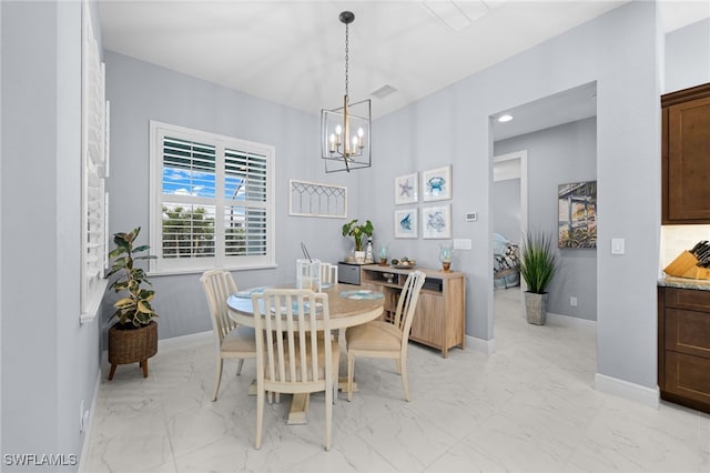 142 SW 35th Ave, Cape Coral, FL 33991 - dining area featuring a chandelier