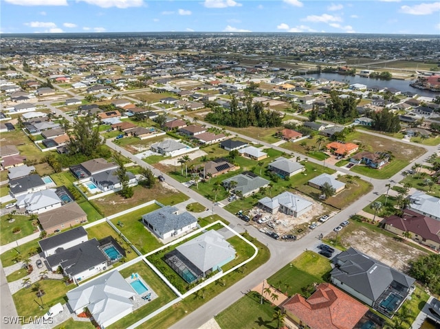 142 SW 35th Ave, Cape Coral, FL 33991 - birds eye view of property with a water view