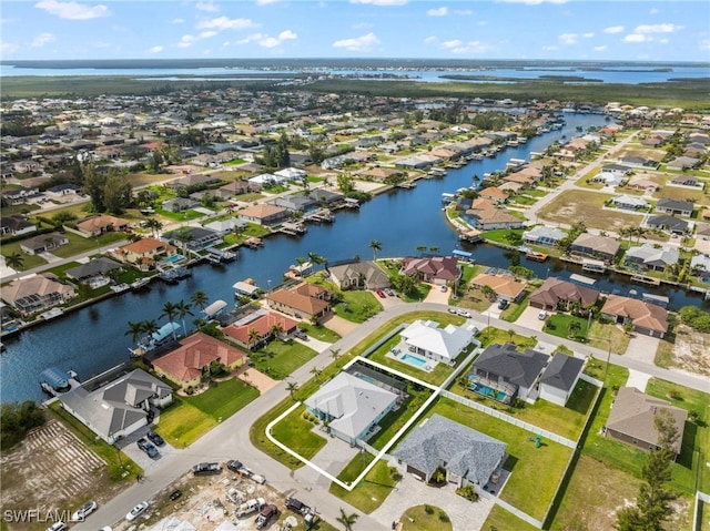 142 SW 35th Ave, Cape Coral, FL 33991 - bird's eye view featuring a water view