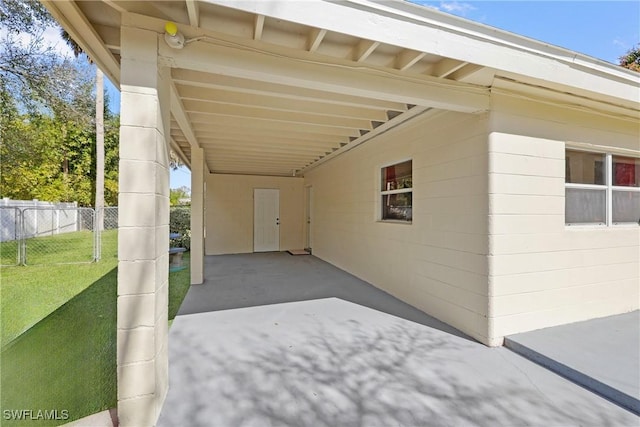 view of patio / terrace featuring a carport
