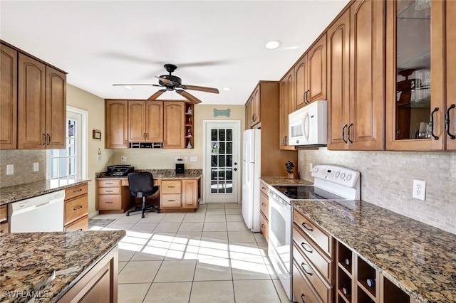 14899 Crescent Cove Dr, Fort Myers, FL 33908 - kitchen featuring white appliances, ceiling fan, stone countertops, and recessed lighting