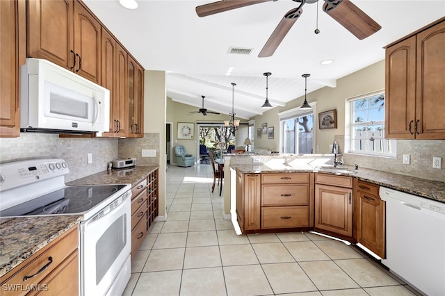 14899 Crescent Cove Dr, Fort Myers, FL 33908 - kitchen with white appliances, ceiling fan, a sink, light tile patterned flooring, and a peninsula