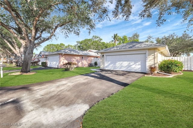 14899 Crescent Cove Dr, Fort Myers, FL 33908 - view of front of home with a garage and driveway