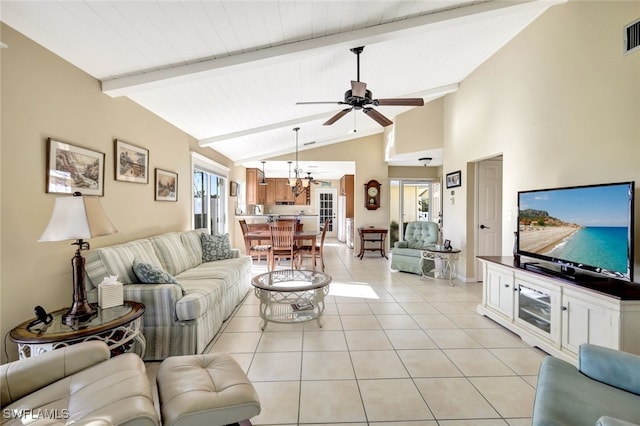 14899 Crescent Cove Dr, Fort Myers, FL 33908 - living area with light tile patterned floors, ceiling fan, and a chandelier