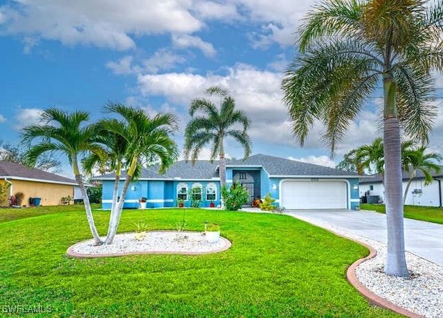 ranch-style home with a garage and a front yard