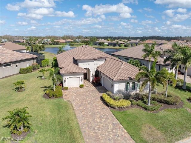 drone / aerial view featuring a water view