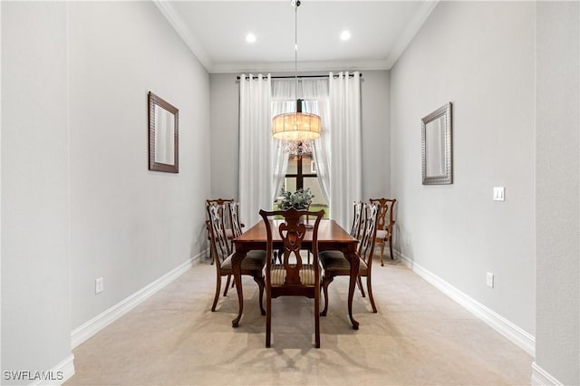 dining space featuring ornamental molding