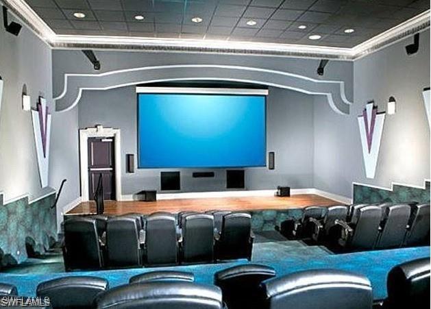 cinema with a drop ceiling and crown molding