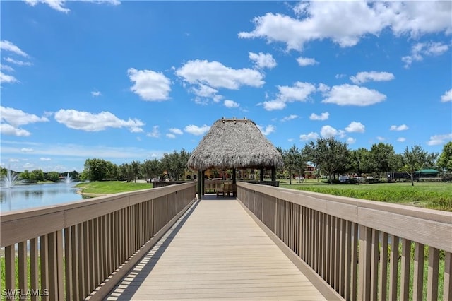 view of community featuring a gazebo and a water view