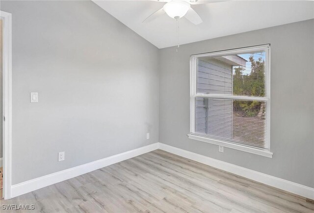 empty room with light hardwood / wood-style flooring and ceiling fan