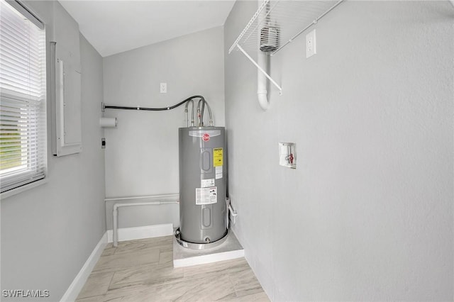 utility room featuring electric water heater