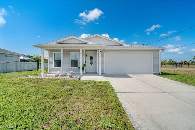 ranch-style home with a front yard, concrete driveway, fence, and an attached garage