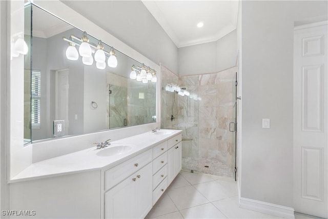 bathroom featuring crown molding, a marble finish shower, a sink, and tile patterned floors