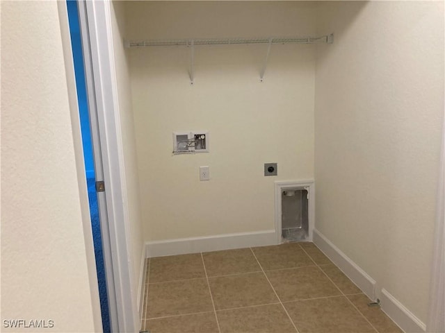 laundry room featuring washer hookup, tile patterned flooring, and electric dryer hookup