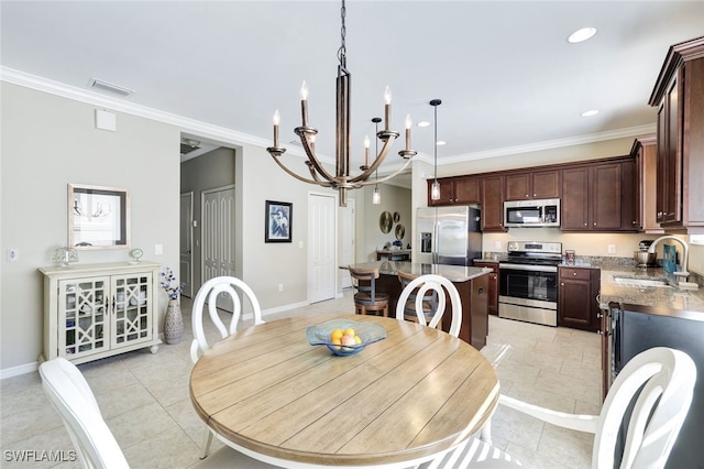 14558 Manchester Dr, Naples, FL 34114 - dining room featuring ornamental molding, sink, and an inviting chandelier