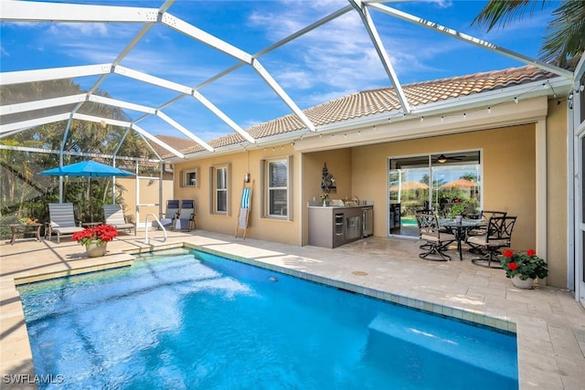 14558 Manchester Dr, Naples, FL 34114 - view of pool with area for grilling, a patio, and glass enclosure