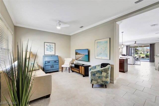 14558 Manchester Dr, Naples, FL 34114 - tiled living room with ceiling fan and ornamental molding