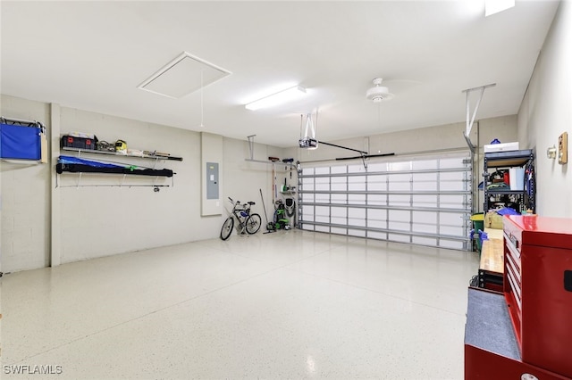 14558 Manchester Dr, Naples, FL 34114 - garage with a garage door opener and electric panel