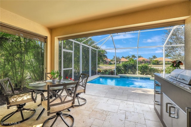 14558 Manchester Dr, Naples, FL 34114 - view of pool with pool water feature, an outdoor kitchen, glass enclosure, and a patio area