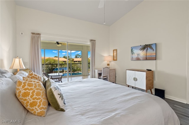 bedroom featuring dark hardwood / wood-style floors, high vaulted ceiling, and access to outside