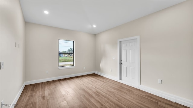 unfurnished room featuring light wood-type flooring