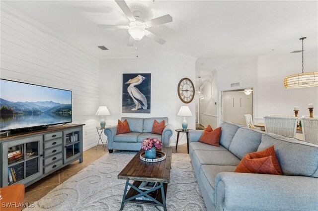 9517 Avellino Way Unit 2224, Naples, FL 34113 - living room with a ceiling fan, tile patterned floors, and baseboards