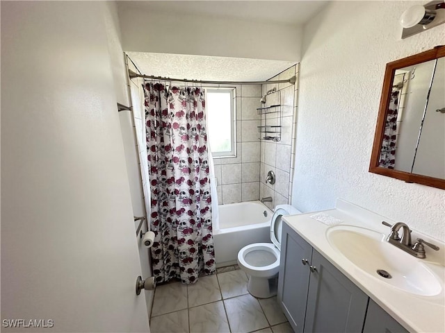 full bathroom with tile patterned floors, vanity, toilet, and shower / bath combo