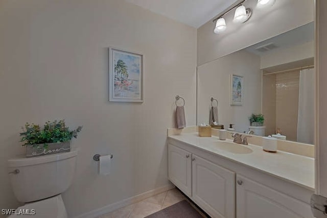 bathroom with a shower with curtain, tile patterned floors, toilet, and vanity