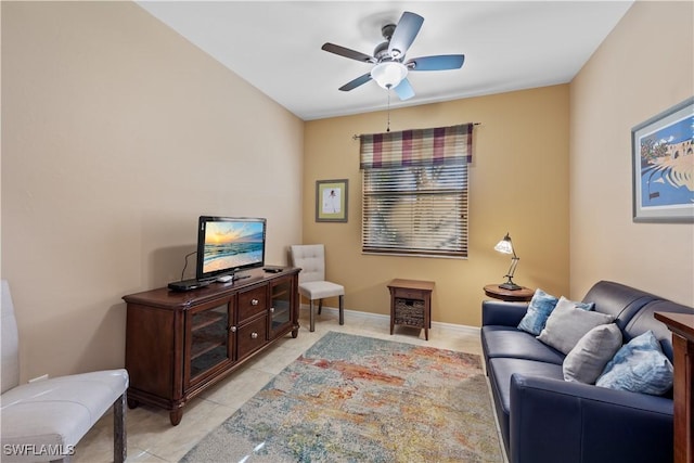 tiled living room featuring ceiling fan