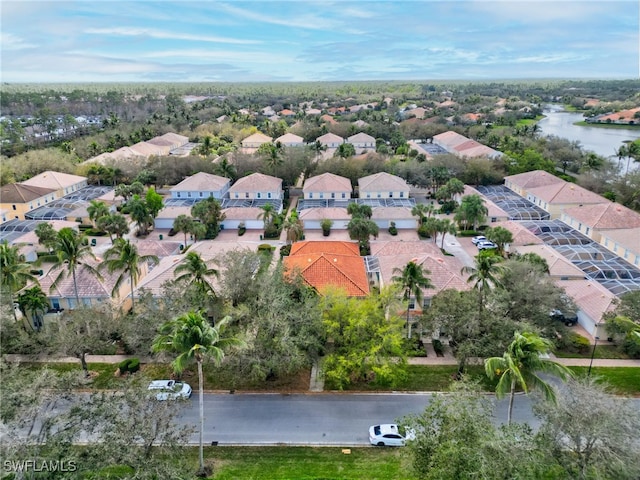 aerial view with a water view and a residential view