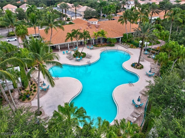 community pool with a patio