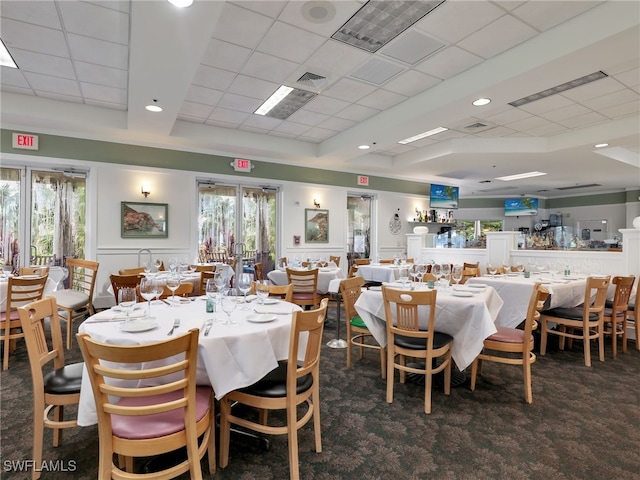 dining space with dark colored carpet, a paneled ceiling, visible vents, and recessed lighting