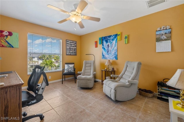 tiled home office with ceiling fan