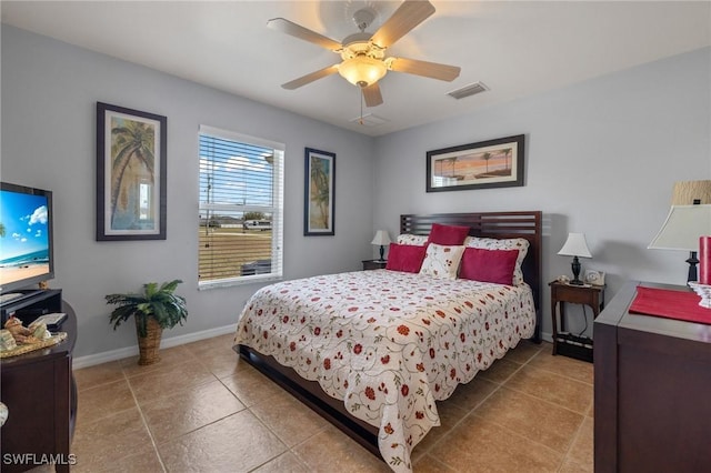 bedroom featuring tile patterned flooring and ceiling fan