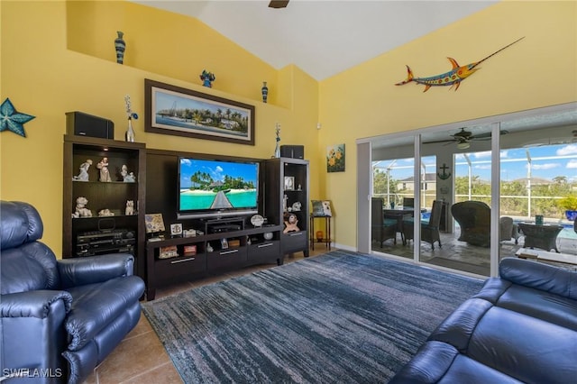 tiled living room with lofted ceiling and ceiling fan