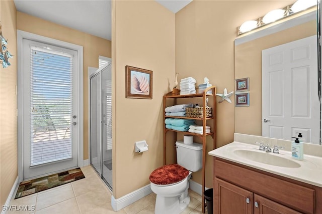 full bath featuring toilet, a shower stall, tile patterned flooring, and vanity