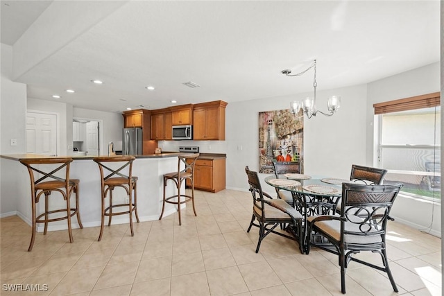 dining room featuring light tile patterned floors, recessed lighting, visible vents, an inviting chandelier, and baseboards