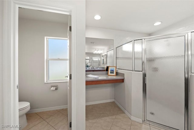 full bath with a stall shower, tile patterned flooring, toilet, and recessed lighting