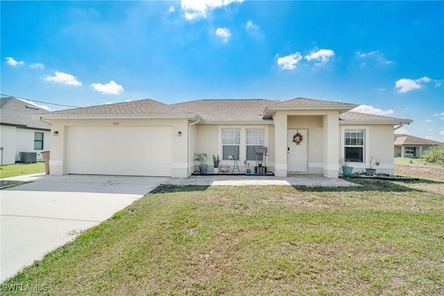 view of front of property with a garage, driveway, a front yard, and stucco siding